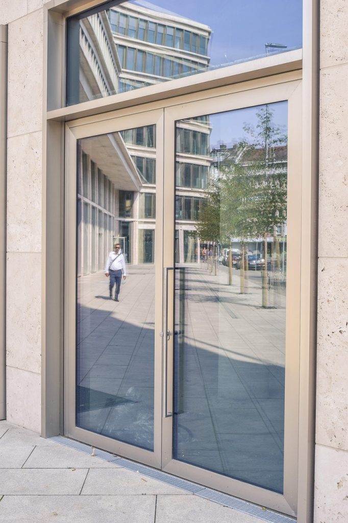 architecture, reflection, building, facade, modern, city, glass, house facade, discs, glass facade, door, road, human, office building, house